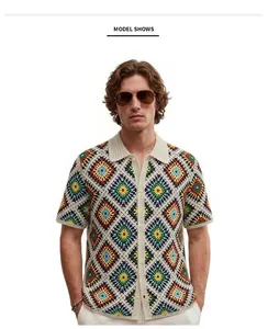 Detailed view of men's crochet hollow-out knitted polo shirt with diamond patterns