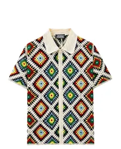 Close-up of multicolored crochet hollow knit short sleeve shirt with diamond patterns
