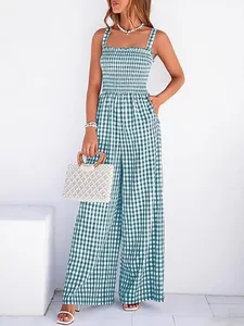 Vintage green gingham wide-leg jumpsuit with smocked bodice for elegant summer fashion