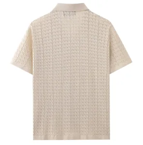 Back view of beige short-sleeved knitted polo shirt with vertical pointelle texture