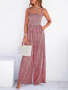 Elegant red and white gingham jumpsuit with a smocked bodice and wide-leg design