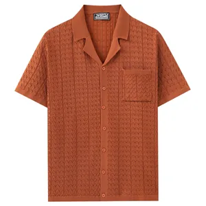 Men's short sleeve knit polo shirt with Cuban collar and textured diamond pattern in rust orange