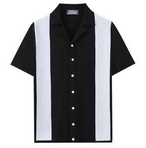 Close-up of black short-sleeved knit shirt with white stripes and Cuban collar