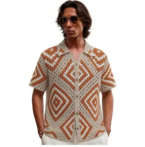 Detailed view of men's hollow crochet short sleeve knitted shirt with diamond pattern