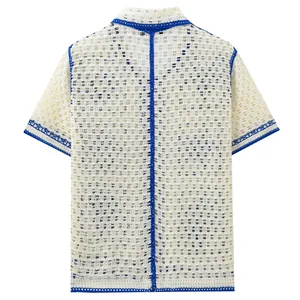 Polo en tricot ajouré pour homme avec bordure bleue contrastée pour les vacances d'été