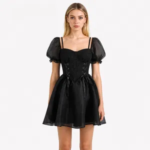 Chic black mini dress featuring organza puff sleeves and a corset-style lace-up front
