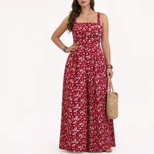Elegant red floral print maxi dress with thin spaghetti straps and a flowing silhouette.