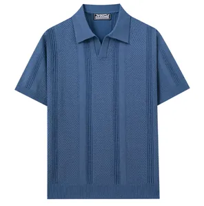 Close-up of the intricate hollow knit texture and vertical stripes on this blue polo