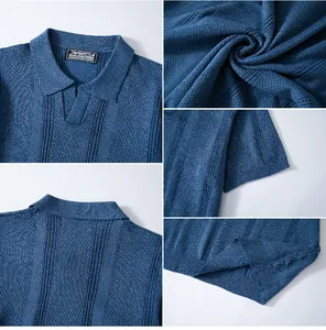 Close-up of blue hollow knit Polo shirt showing fabric texture and collar details