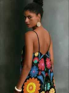Back view detail of a summer ethnic floral print backless slip dress for vacation