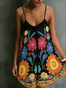 Detailed view of summer black camisole dress with vibrant ethnic floral embroidery