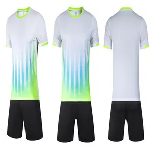 Front, side, and back views of a white soccer jersey with blue gradient and black shorts