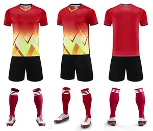 Ensemble de football dégradé rouge et jaune comprenant maillot short et chaussettes