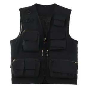Close-up of black multi-pocket outdoor vest with functional zippers and mesh lining