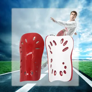 Detailed view of professional soccer shin guards featuring EVA soft impact protection for sports.