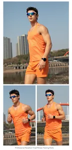 Men's orange marathon running tank top and shorts set with breathable mesh