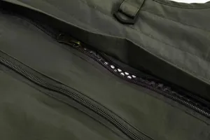 Close-up of durable zippers and olive green fabric on a multi-pocket outdoor tactical vest.
