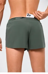 Close-up of quick-dry running shorts with a convenient back zipper pocket for phone
