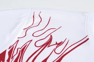 Macro view of quick-dry mesh fabric and red graphic design on white dragon boat jersey