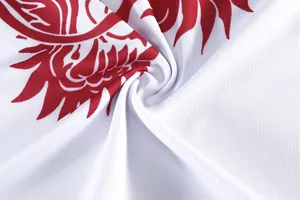 Macro view of breathable quick-dry white mesh fabric with red dragon boat print