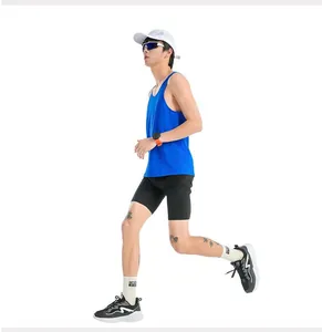 Side view of male model running in blue quick-dry athletic tank top for marathon training