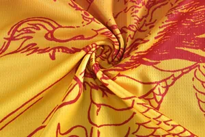 Close-up of breathable quick-dry mesh fabric with traditional red dragon print detail
