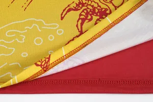 Detailed close-up view of high-quality stitching on a quick-dry dragon boat racing jersey