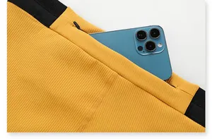Close-up of men's quick-dry running shorts with a hidden zipper pocket for secure phone storage