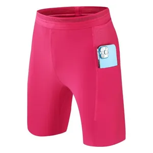 Men's pink quick-dry compression shorts with functional side phone pocket for sports