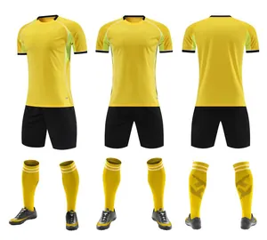 Three-angle view of yellow and black quick-dry football kit with jersey, shorts, and socks