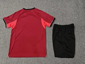 Back view of red and black quick-dry football jersey and shorts athletic training set
