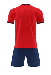 Back view detail of breathable red soccer jersey and navy blue shorts training set