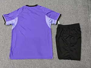 Back view of purple football jersey and black shorts set with breathable fabric