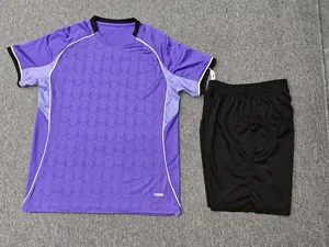 Purple soccer jersey and black shorts set with geometric pattern and white piping