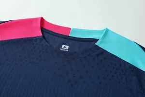 Detailed macro view of soccer training jersey collar showing breathable mesh fabric texture