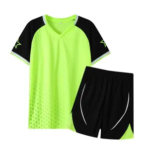 Detail view of fluorescent green and black quick-dry soccer jersey and shorts set