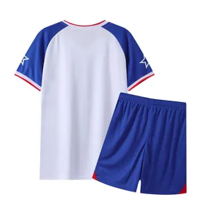 Two-piece set featuring a quick-dry soccer jersey and matching blue sports shorts