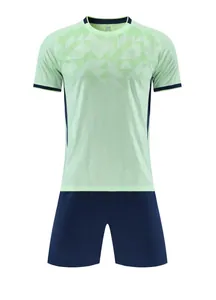 Breathable jacquard soccer kit featuring a light green jersey and navy blue shorts