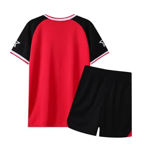 Detail view of quick-drying soccer jersey set in vibrant red and black sports colors.