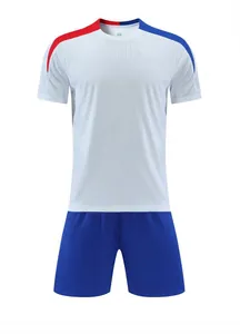 Professional blank soccer training kit featuring a white jersey with red and blue accents