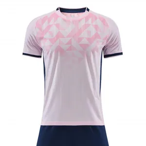 Pink jacquard soccer jersey set featuring geometric patterns and navy blue accents