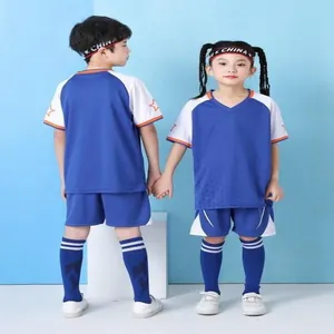 Children's quick-drying blue and white soccer uniform set for training and sports.