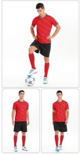 Male model wearing red and black football kit, jersey and shorts set for sports training
