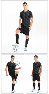 Professional black soccer uniform set featuring patterned short sleeves and matching shorts.