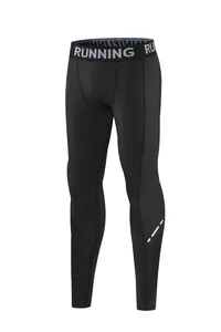 Detail view of children's black quick-dry compression pants with Running waistband design