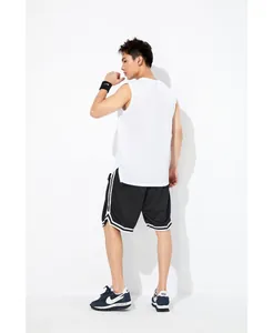 Detail view of the back of a white quick-dry basketball tank top with side slits