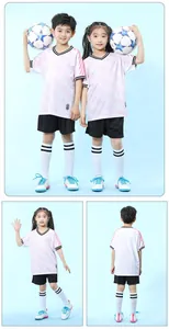 Detailed view of children's soccer uniform set with pink and white patterned jersey