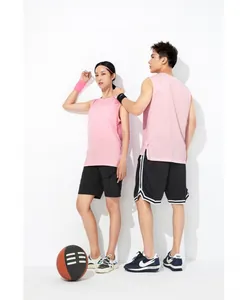 Two professional models wearing pink quick-dry sports tank tops for basketball training gear.