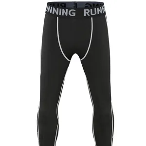 Kids black quick-drying compression tights with white stitching and RUNNING waistband