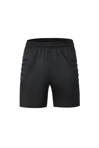 Detailed view of black padded goalkeeper shorts for soccer training and match play